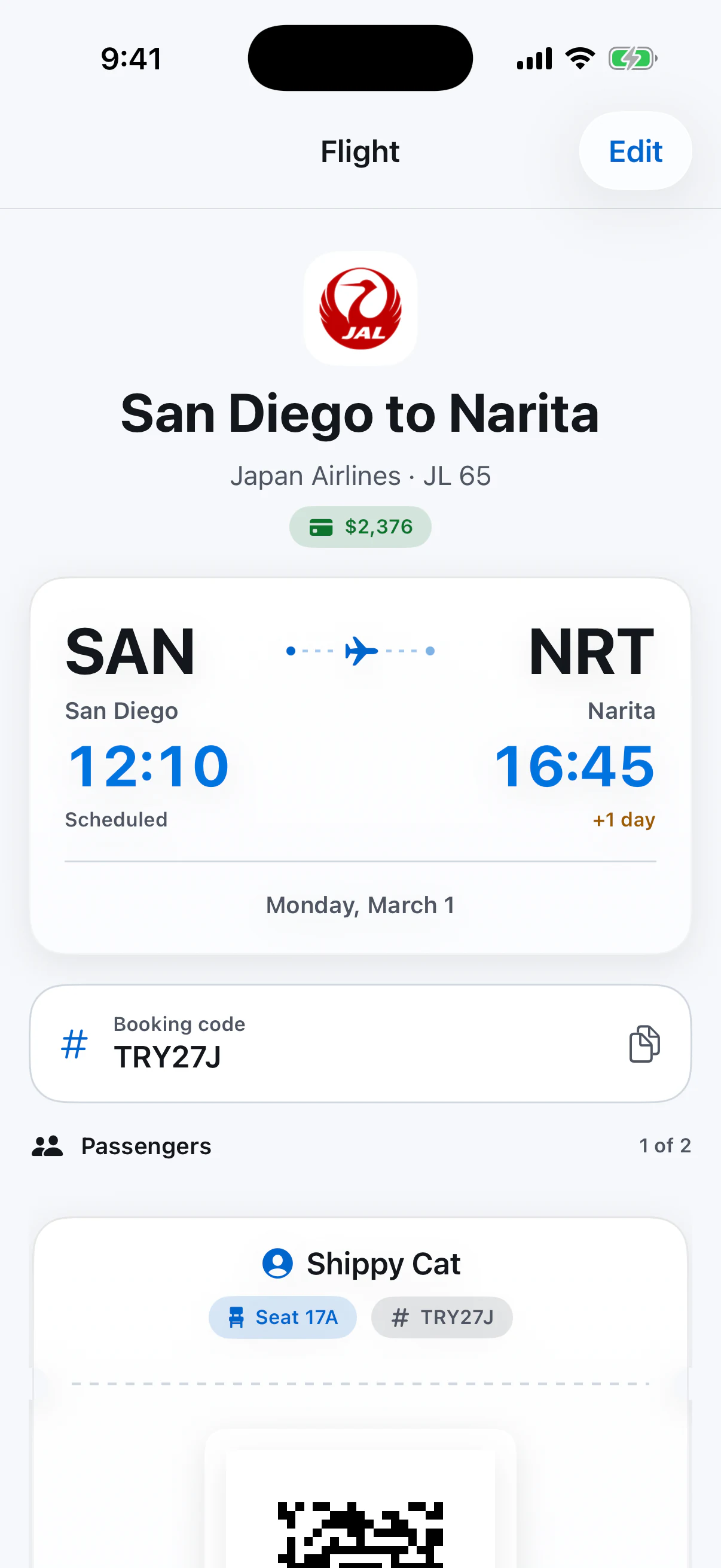 Flight detail with a next-day arrival label, booking code, and traveler ticket information